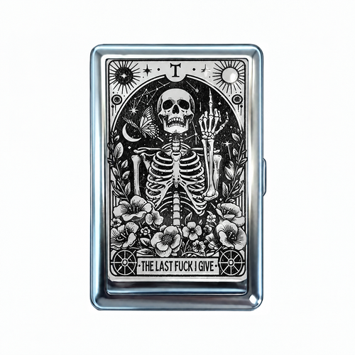 Over It tin cardholder wallet, closed, printed with a black and white tarot card of a skeleton out of patience.