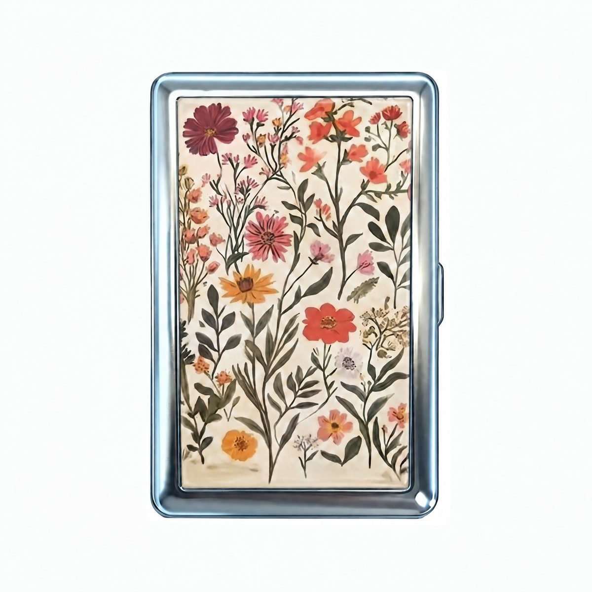 Pressed tin cardholder wallet, closed, printed with wildflowers laid out flat like a pressed flower sheet.