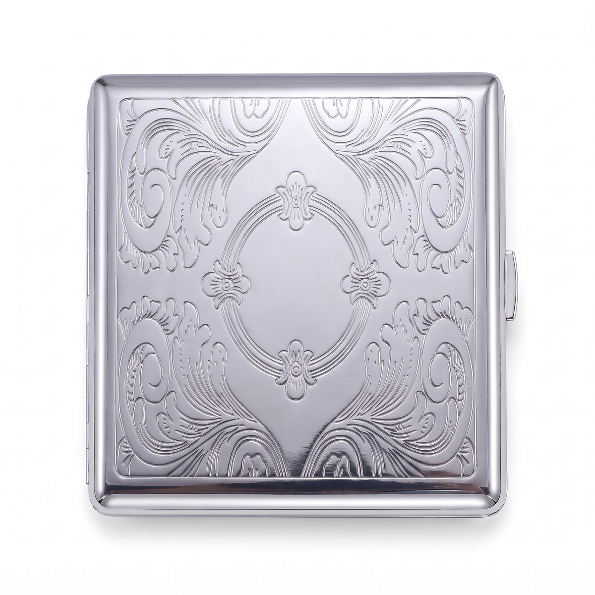 Reliquary chrome cardholder wallet, closed, embossed with an ornate scrollwork frame around an empty centre.