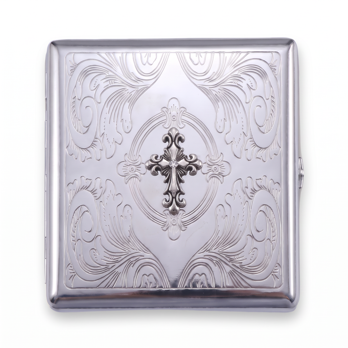 Sanctum chrome cardholder wallet, closed, embossed with an ornate cross inside heavy scrollwork.