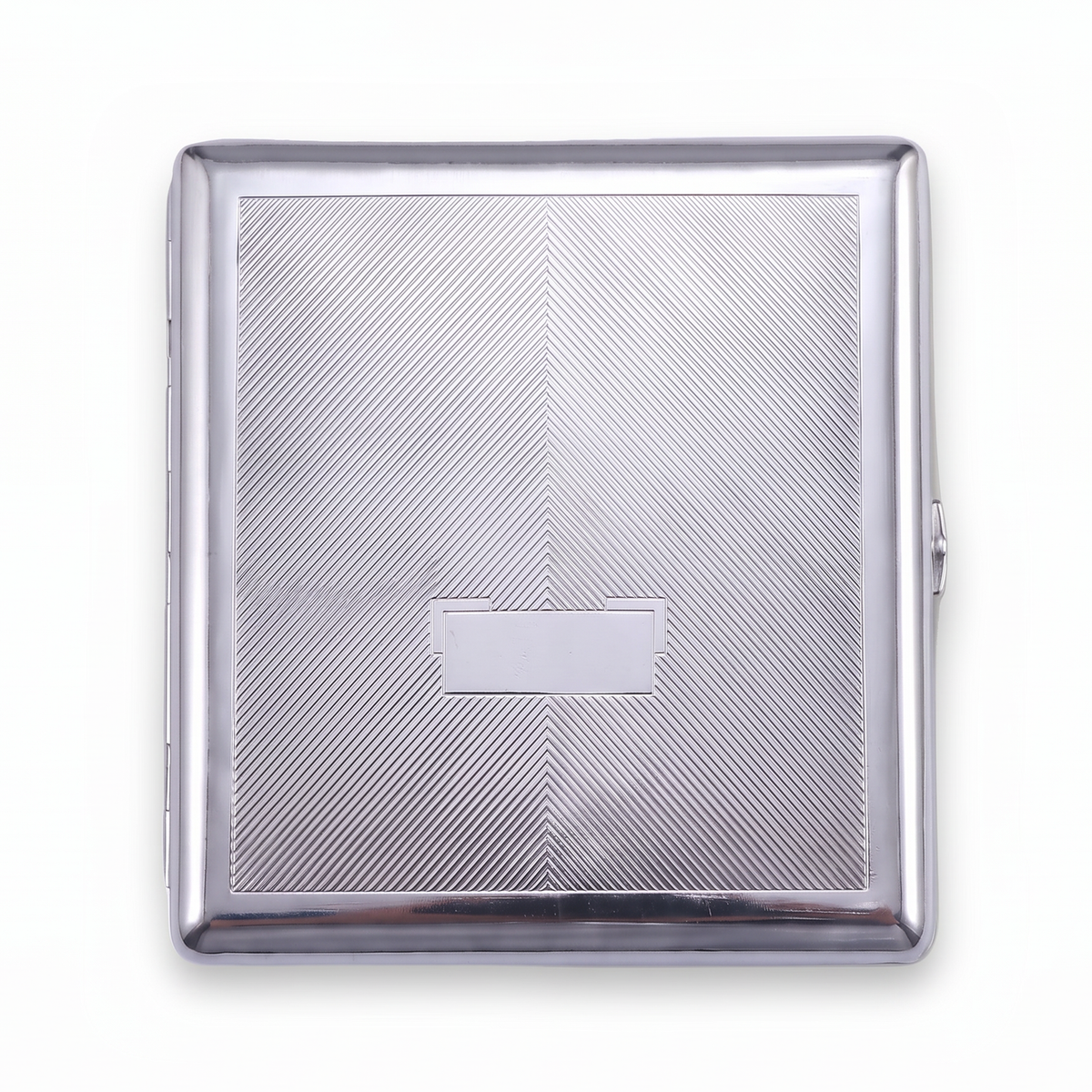 Silverpoint chrome cardholder wallet, closed, diagonal brushed steel with a small blank nameplate.