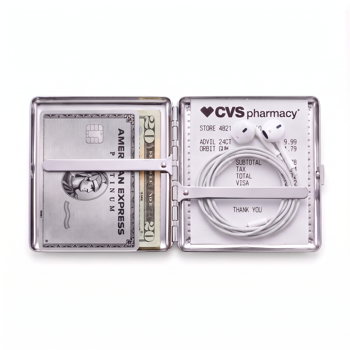 Chrome cardholder wallet open, holding a metal credit card, a folded banknote, wired earbuds and a receipt